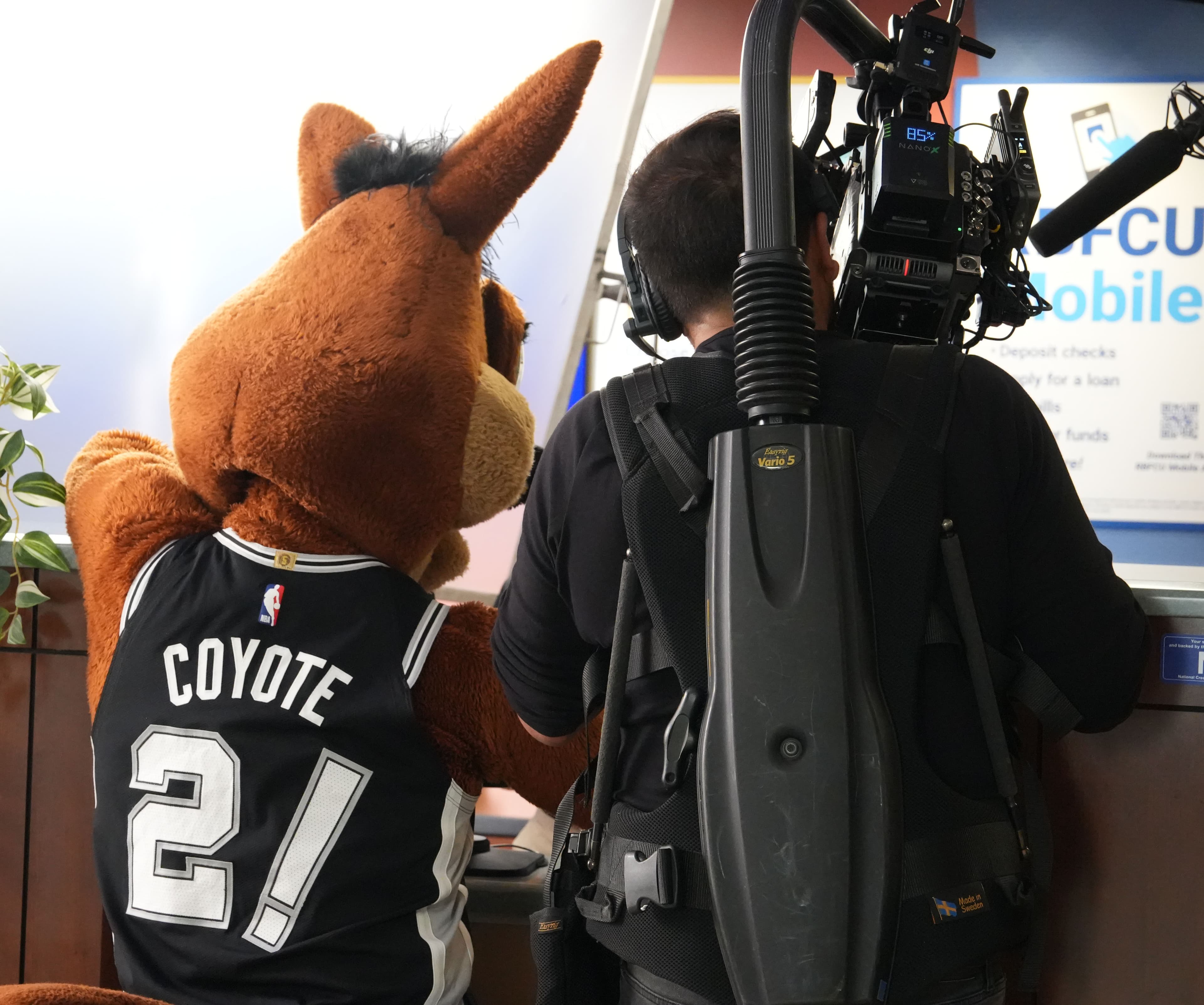 Media Bar camera operator filming the Spurs Coyote for a commercial