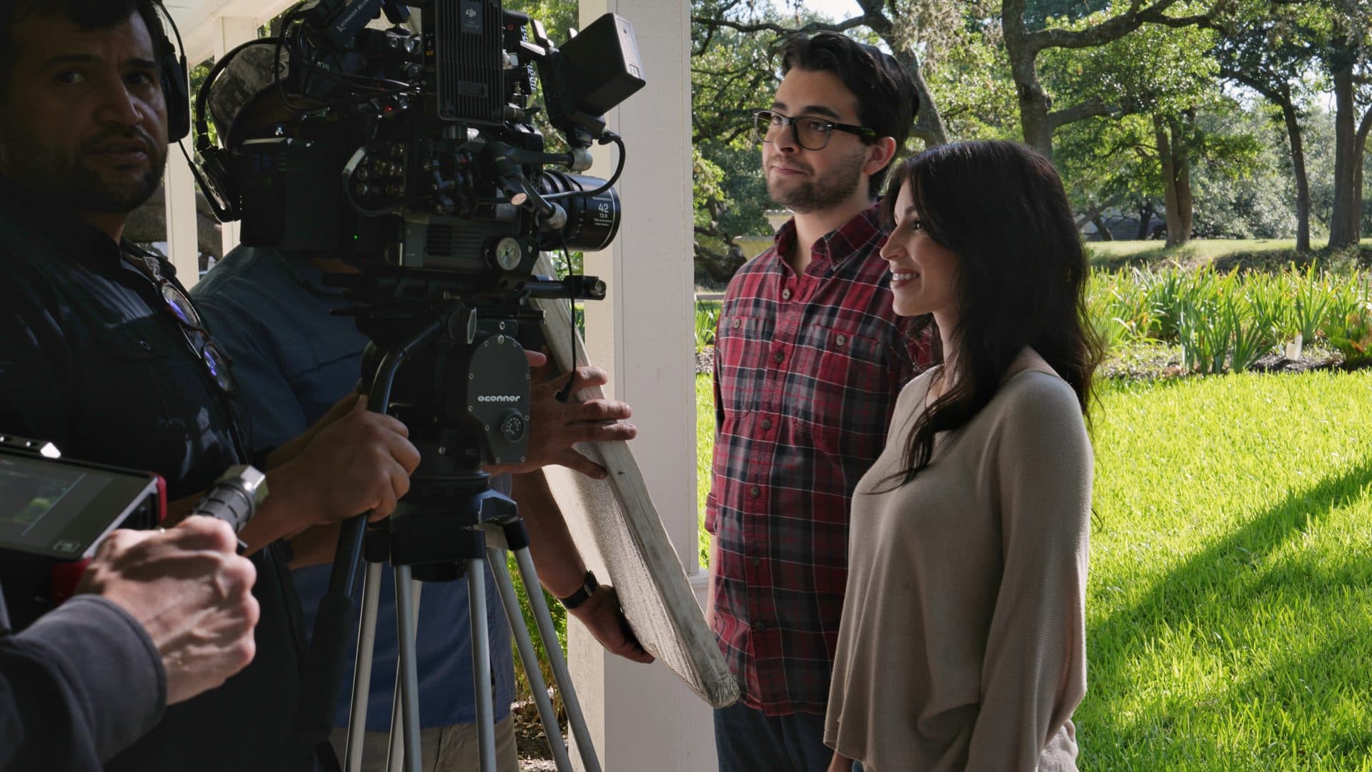 Commercial production crew filming performers for a Texas campaign